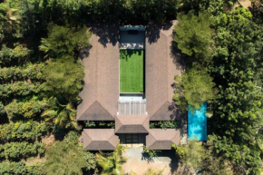 Farmhouse Retreat by StayVista - Classic architecture, Rustic interiors, Cozy rooms & A refreshing swimming pool